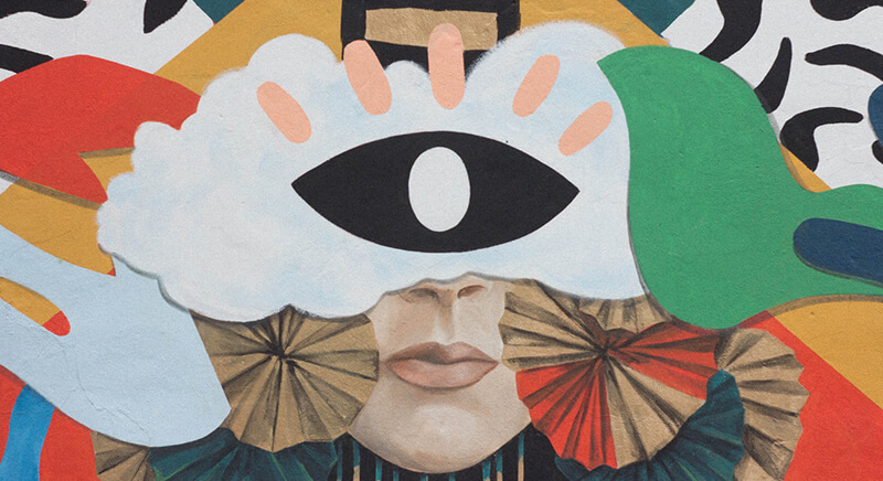 Image of collage artwork featuring a large eye over a caucasian face