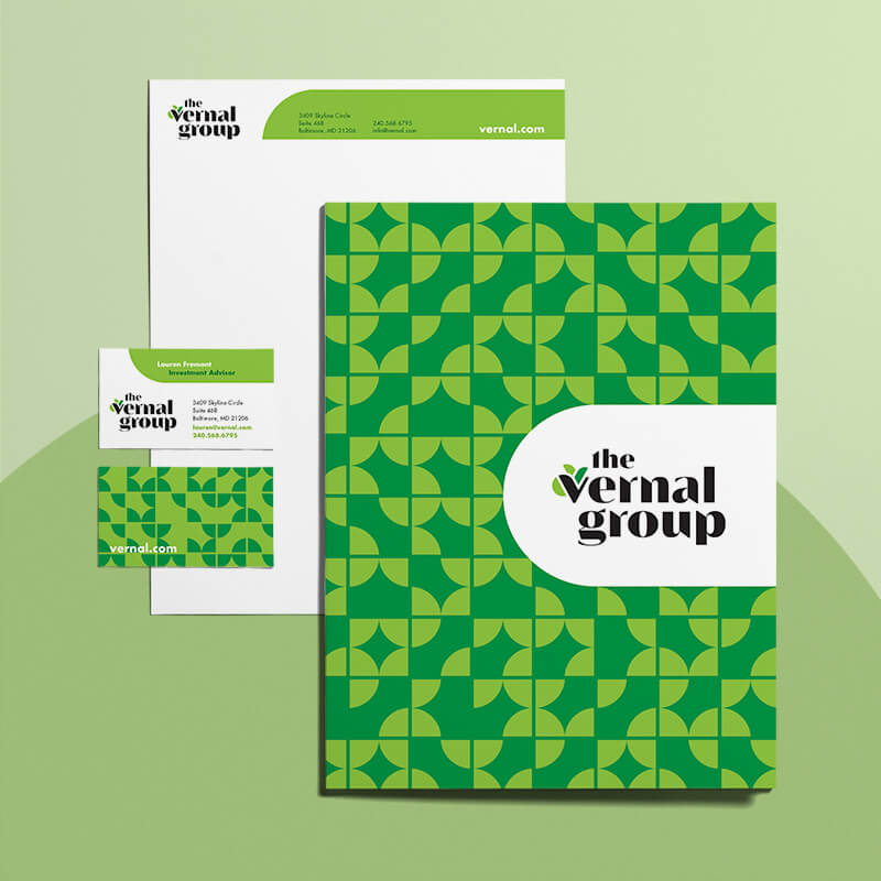 Image of Vernal Group letterhead, folder and business cards