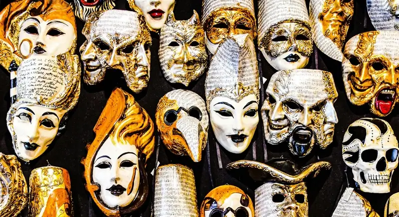 Display of classic Italian masks with different characters, birds, skulls and monsters